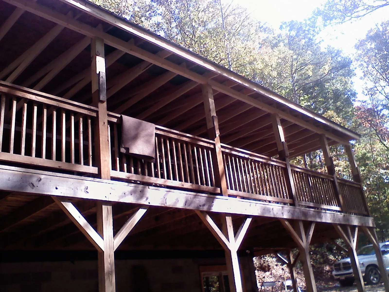 Timber framing under a new elevated porch and deck — Roof Leak Repair in East Otis by Roofing Brothers